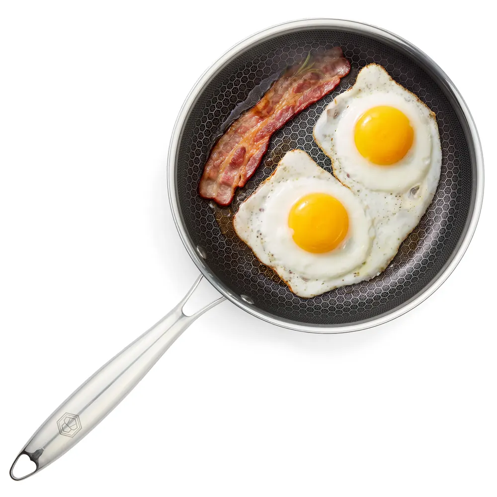 Fried eggs and bacon in a HexChef honeycomb frying pan