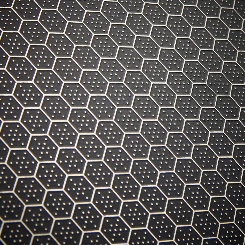 Macro close-up of the HexChef honeycomb hybrid surface